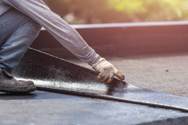 Professional Basement Waterproofing technician working in New Baltimore, OH